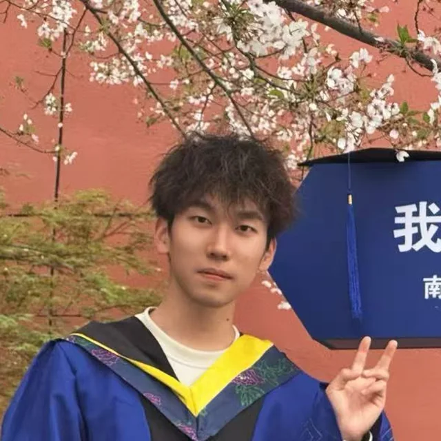 Jinbo Wen in graduation attire